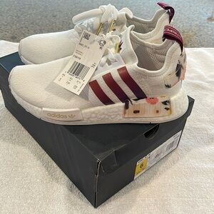 Womens Adidas NMD R1.  White with burgundy stripes and floral heel.